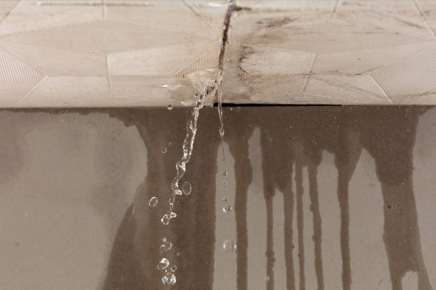 Professional Flood Damage Cleanup technician working in East Waterboro, ME